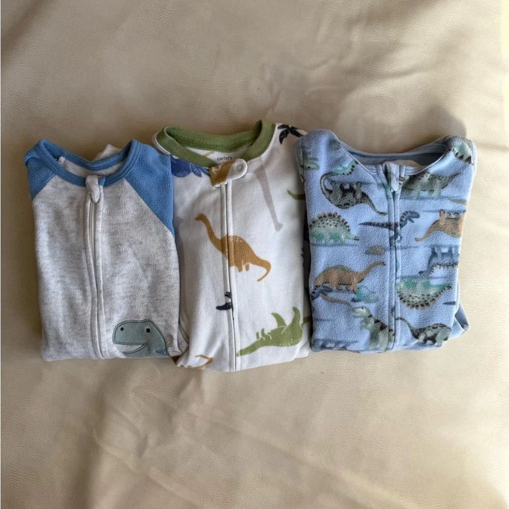 Bundle of dinosaur footed pajamas